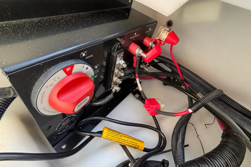 Slide: The Image of Electrical panel with red switch and wiring in a 2026 Viaggio Z24U. - 39