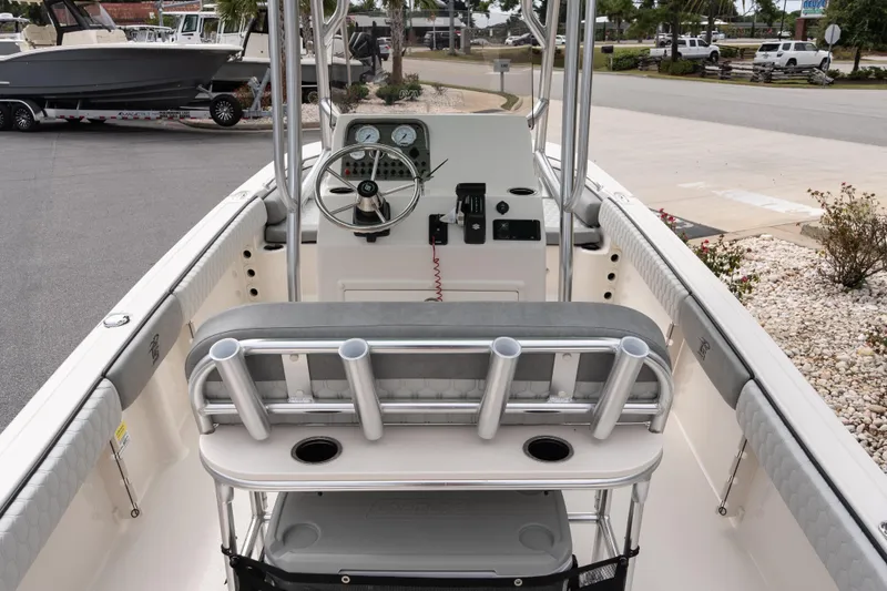 Slide: The Image of 2026 Carolina Skiff 21 Ultra Elite boat interior with steering console and seating. - 9