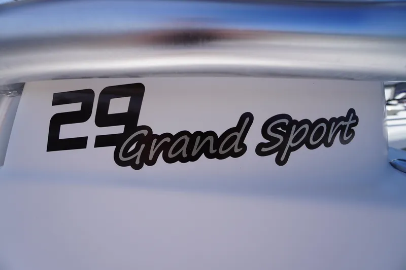 Slide: The Image of 2016 Pro-Line 29 Grand Sport boat logo, sleek design and bold lettering. - 5