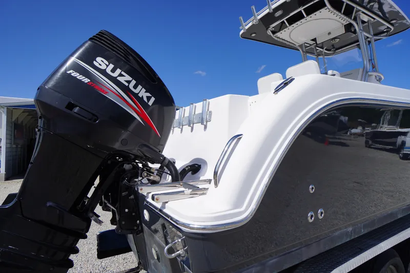 Slide: The Image of 2016 Pro-Line 29 Grand Sport boat with Suzuki Four Stroke engine, side view. - 61