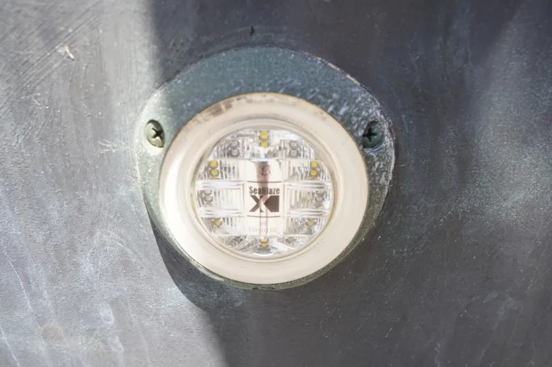 Slide: The Image of LED light on 2016 Pro-Line 29 Grand Sport boat hull. - 63