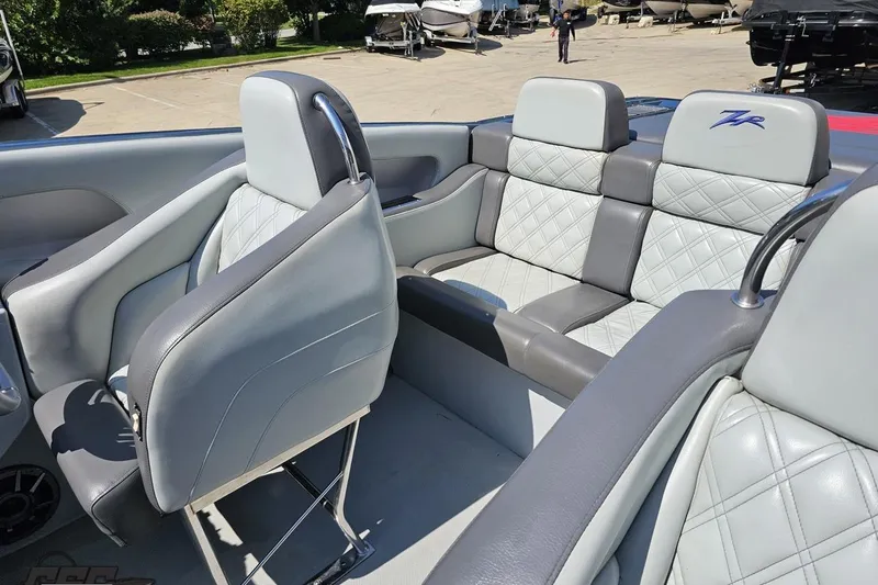 Slide: The Image of 2007 Donzi 35 ZR boat interior with gray quilted leather seats and sleek design. - 102