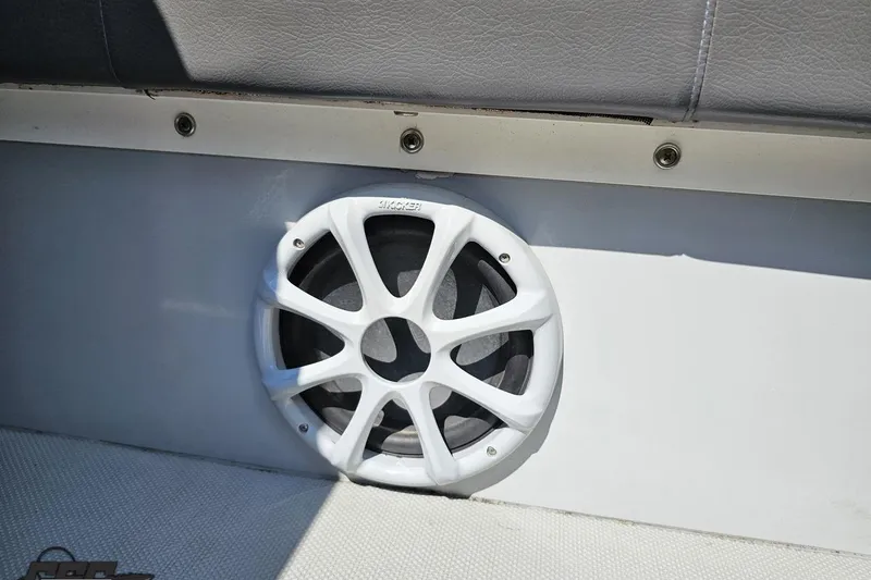 Slide: The Image of White speaker on a 2007 Donzi 35 ZR boat interior panel. - 107