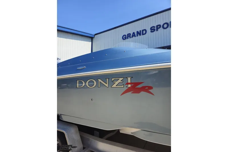 Slide: The Image of 2007 Donzi 35 ZR boat side view at Grand Sport Center. - 12