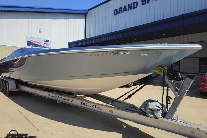 Slide: The Image of 2007 Donzi 35 ZR speedboat on trailer outside Grand Sport Center. - 18