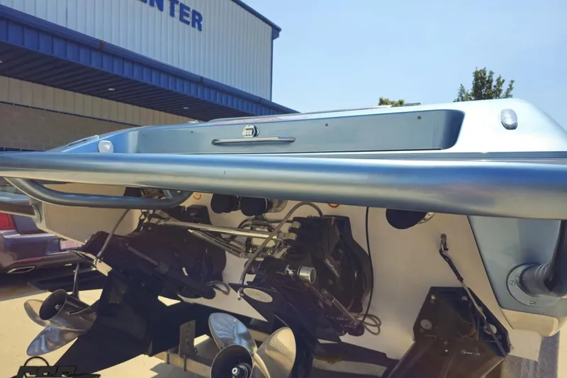 Slide: The Image of 2007 Donzi 35 ZR boat stern view with dual propellers and outboard motors. - 40