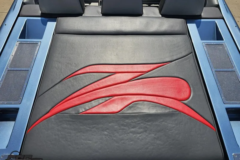 Slide: The Image of 2007 Donzi 35 ZR boat interior with sleek red and black upholstery design. - 49