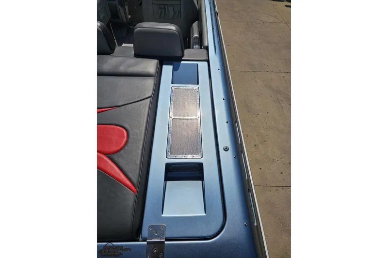 Slide: The Image of 2007 Donzi 35 ZR boat interior with sleek seating and metallic accents. - 51