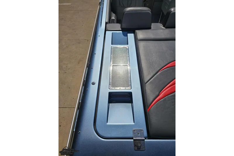 Slide: The Image of 2007 Donzi 35 ZR boat interior with sleek seating and metallic accents. - 52