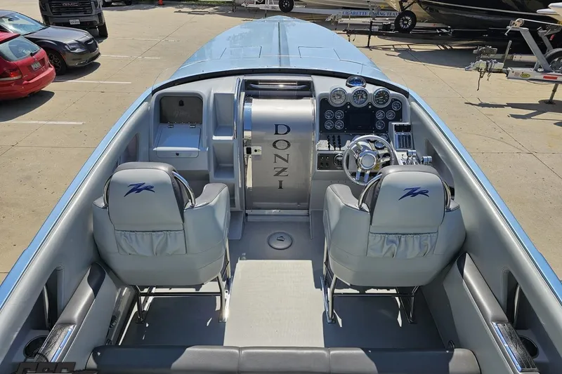 Slide: The Image of 2007 Donzi 35 ZR boat interior with sleek dashboard and dual seating. - 54
