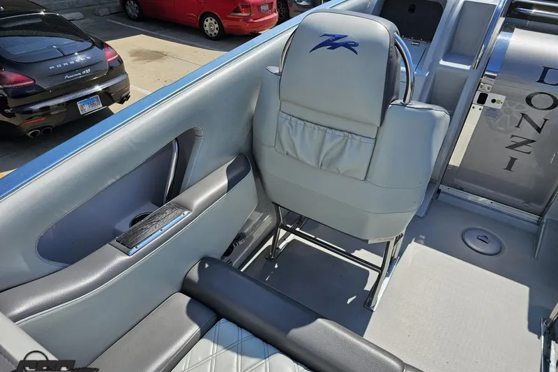 Slide: The Image of 2007 Donzi 35 ZR boat interior with sleek seating and modern design elements. - 58