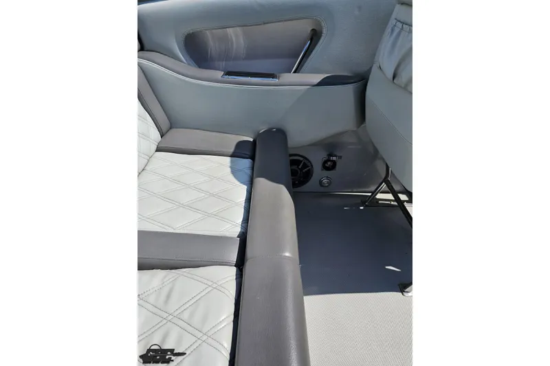 Slide: The Image of 2007 Donzi 35 ZR interior with gray leather seating and speaker detail. - 62
