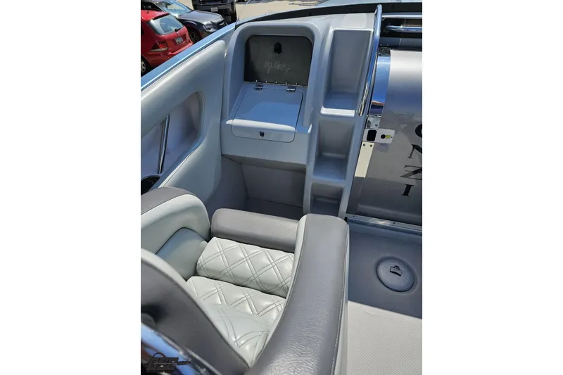 Slide: The Image of Interior of a 2007 Donzi 35 ZR boat featuring luxurious seating and sleek design. - 63