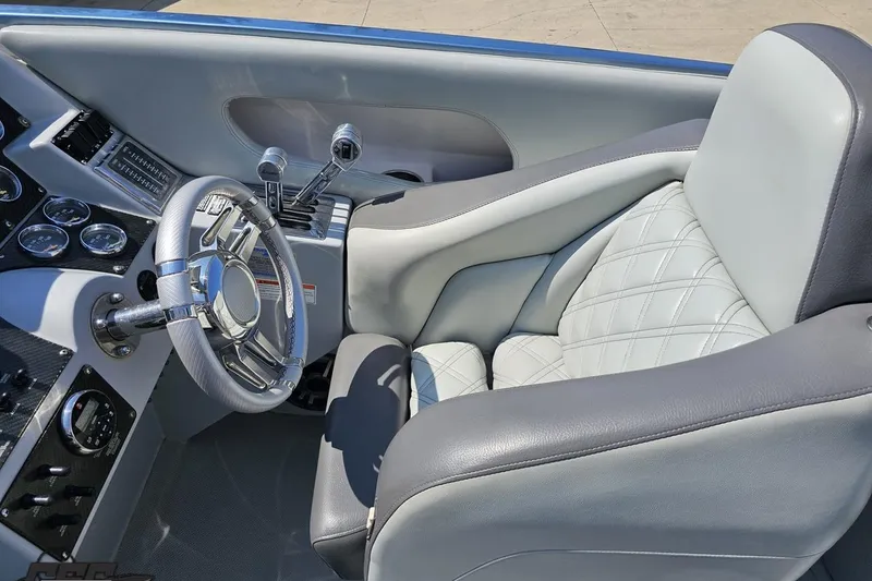 Slide: The Image of Interior of 2007 Donzi 35 ZR boat with luxury steering and controls. - 66