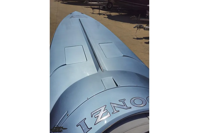 Slide: The Image of 2007 Donzi 35 ZR boat, top view, sleek blue design on display. - 75