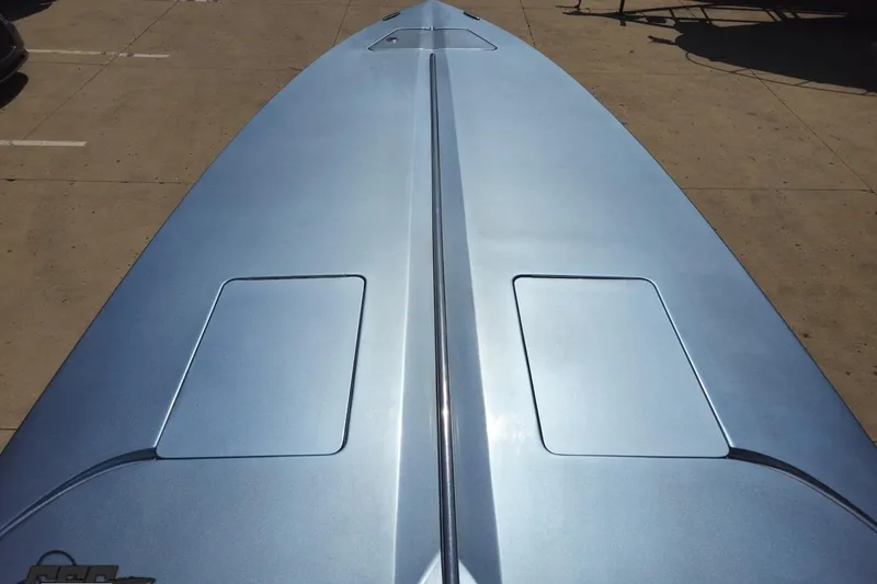 Slide: The Image of 2007 Donzi 35 ZR boat deck, sleek metallic finish, viewed from above. - 76