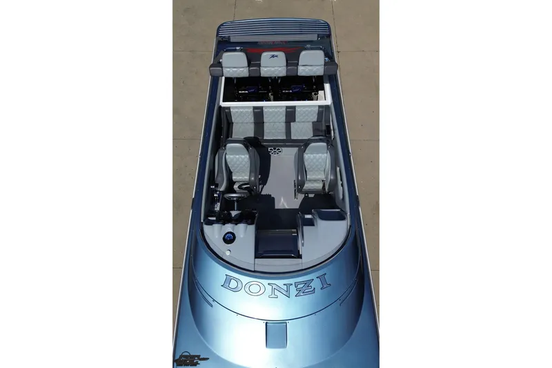 Slide: The Image of 2007 Donzi 35 ZR speedboat, aerial view showcasing sleek design and seating arrangement. - 79