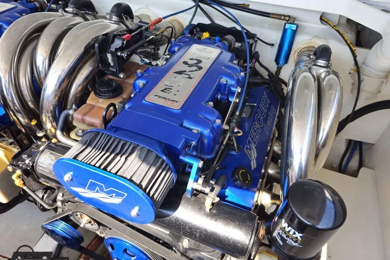 Slide: The Image of 2007 Donzi 35 ZR engine with Mercury Racing components and blue accents. - 84