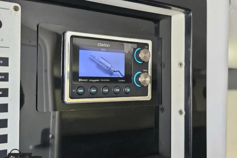 Slide: The Image of Clarion audio system in 2007 Donzi 35 ZR boat dashboard. - 93