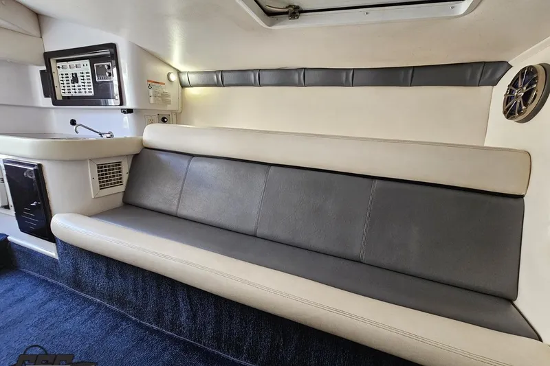 Slide: The Image of 2007 Donzi 35 ZR cabin interior with leather seating and control panel. - 95