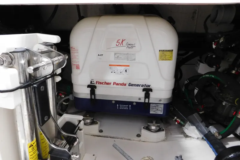 Slide: The Image of Fischer Panda generator in 2022 Pursuit S 328 Sport boat engine compartment. - 20