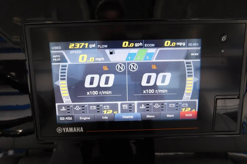 Slide: The Image of Yamaha display panel on 2022 Pursuit S 328 Sport boat showing fuel and speed metrics. - 30