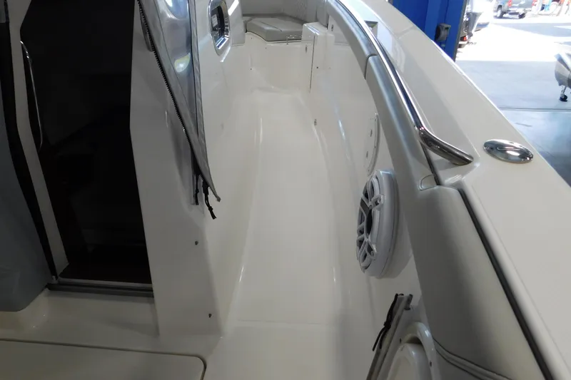 Slide: The Image of 2022 Pursuit S 328 Sport boat interior with sleek design and stainless steel railings. - 37