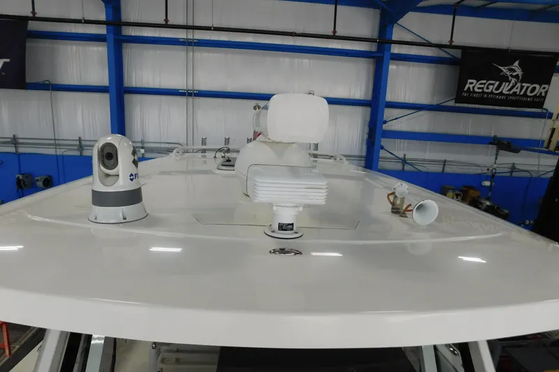 Slide: The Image of 2022 Pursuit S 328 Sport boat with advanced radar and communication equipment. - 42