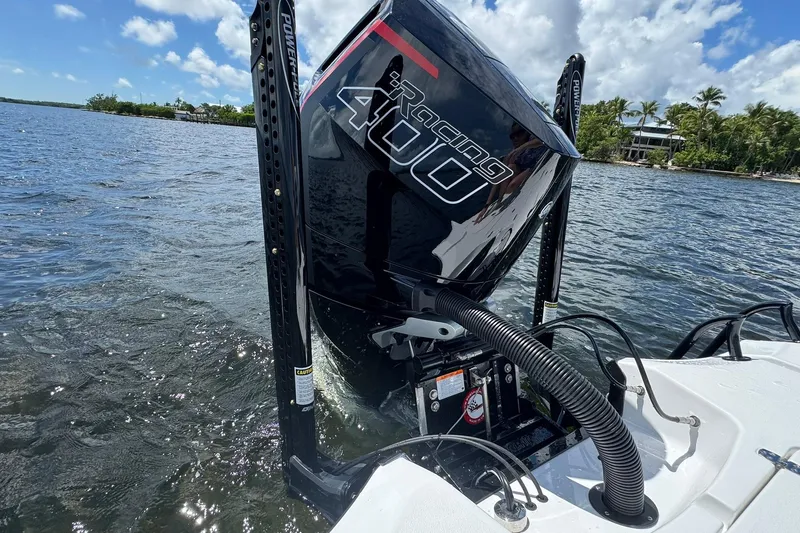 Slide: The Image of 2026 Blazer 2550 GTS boat with powerful Racing 400 engine on a sunny day. - 6