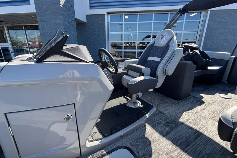 Slide: The Image of Captain's chair and helm of 2026 Viaggio Z24U boat, showcasing modern design and comfort. - 16