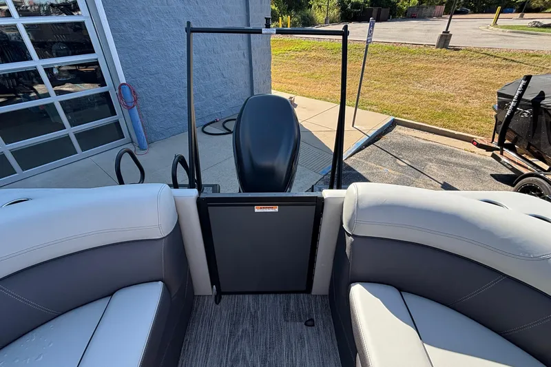 Slide: The Image of Interior view of 2026 Viaggio Z24U boat with gray seating and outdoor background. - 11