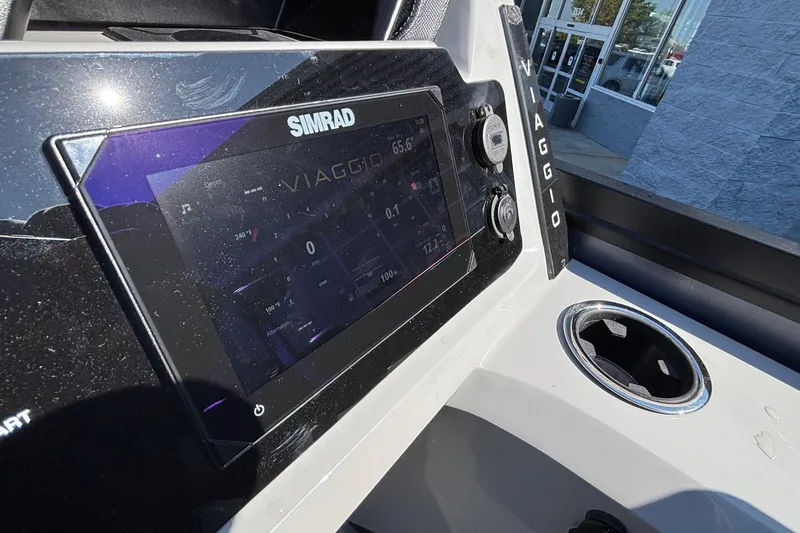 Slide: The Image of 2026 Viaggio Z24U dashboard with Simrad display, showcasing modern navigation technology. - 25