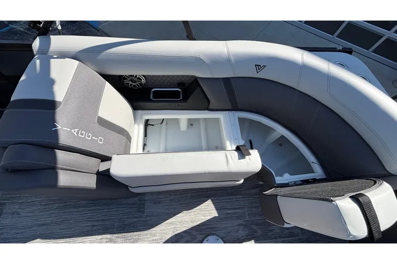 Slide: The Image of 2026 Viaggio Z24U boat interior with open storage compartment and cushioned seating. - 32