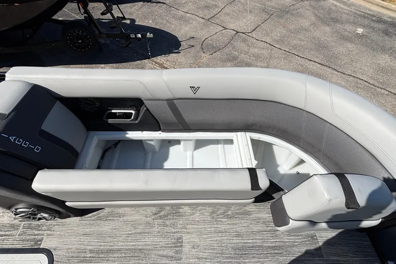 Slide: The Image of Viaggio Z24U 2026 boat interior with open storage compartment and gray seating. - 36