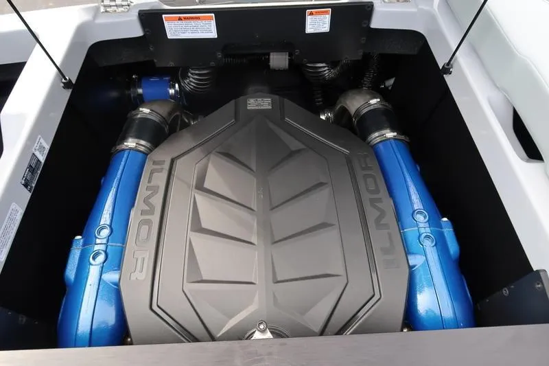 Slide: The Image of 2026 MasterCraft NXT22 boat interior with sleek seating and modern dashboard design. - 16