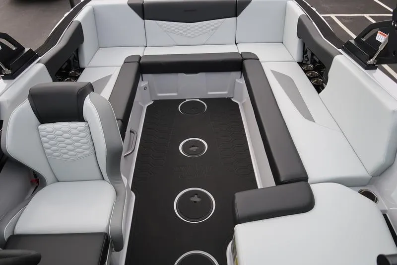Slide: The Image of 2026 MasterCraft NXT22 boat interior with sleek seating and modern design. - 5