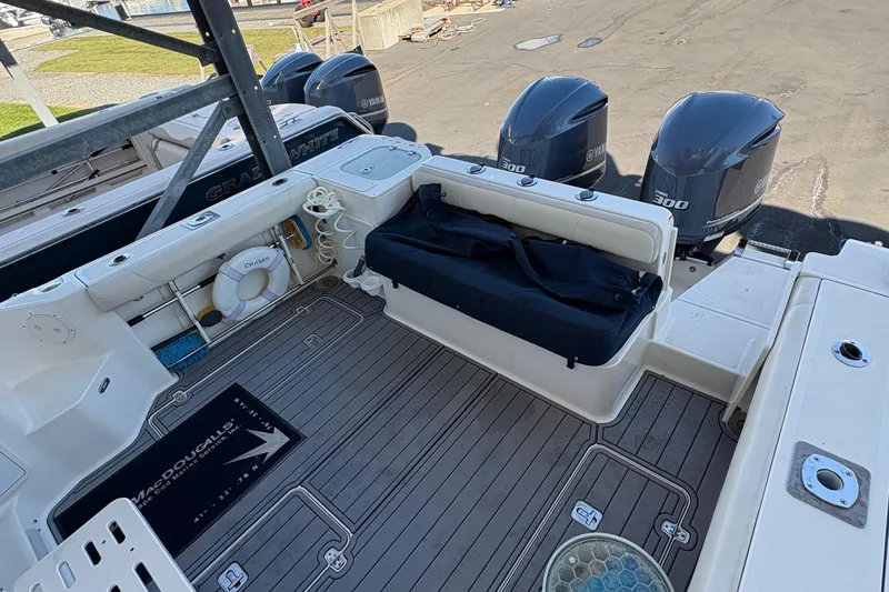 Slide: The Image of Kenyon stove on 2013 Pursuit OS 315 Offshore boat, covered with countertop. - 28