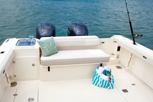 Slide: The Image of 2013 Pursuit OS 315 Offshore boat with twin Yamaha 300 V6 outboard engines. - 7