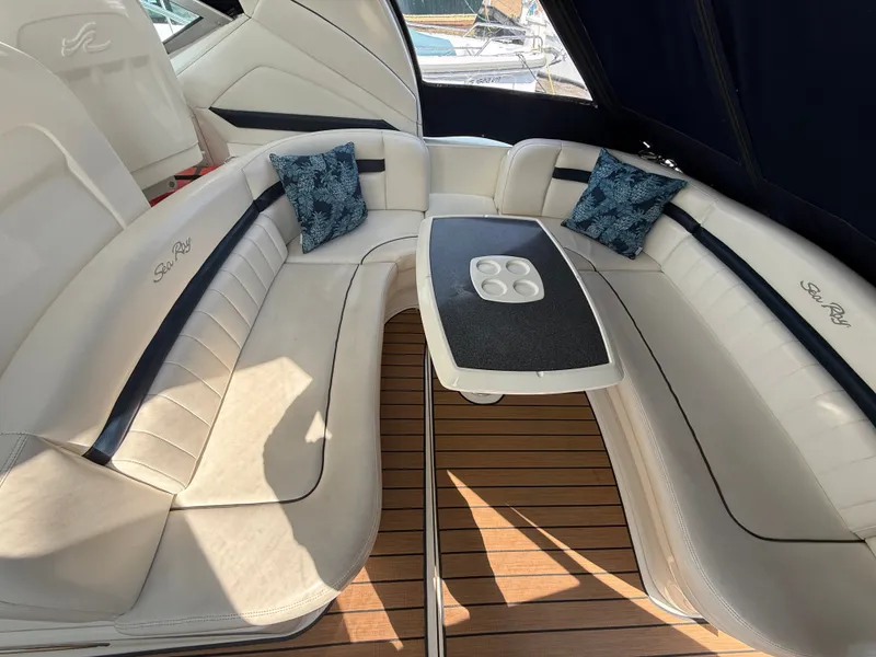 Slide: The Image of Luxurious seating area on a 2004 Sea Ray 390 Sundancer yacht with elegant cushions. - 3