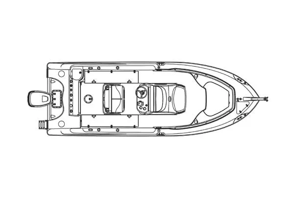 Slide: The Image of 2006 Boston Whaler 240 Outrage boat on trailer, parked near a building, clear sky background. - 2