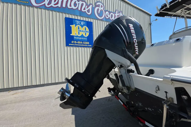 Slide: The Image of 2006 Boston Whaler 240 Outrage with Mercury outboard at Clemons Boats dealership. - 6