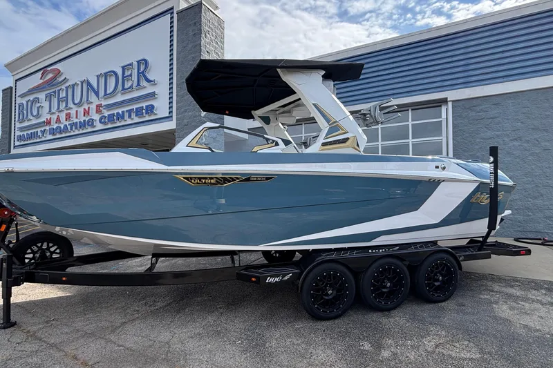 The Image of 2026 Tigé Ultré 25ZX boat on trailer at Big Thunder Marine center. - 1