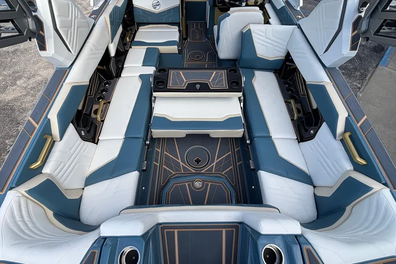 Slide: The Image of 2026 Tigé Ultré 25ZX boat interior with luxurious seating and modern design. - 17