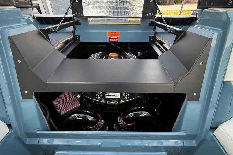 Slide: The Image of 2026 Tigé Ultré 25ZX boat engine compartment, showcasing modern design and engineering. - 28