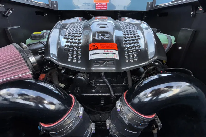Slide: The Image of Engine of 2026 Tigé Ultré 25ZX boat, featuring Indmar 575 horsepower. - 29