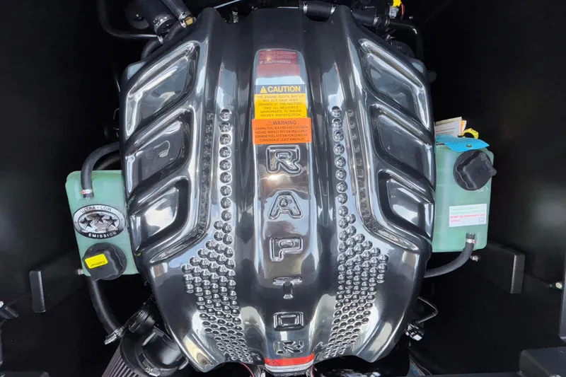 Slide: The Image of Engine of 2026 Tigé Ultré 25ZX boat, featuring Raptor branding and ultra-low emissions. - 30