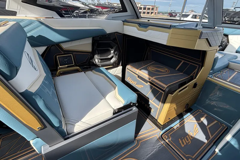 Slide: The Image of 2026 Tigé Ultré 25ZX interior with luxurious seating and modern design elements. - 40