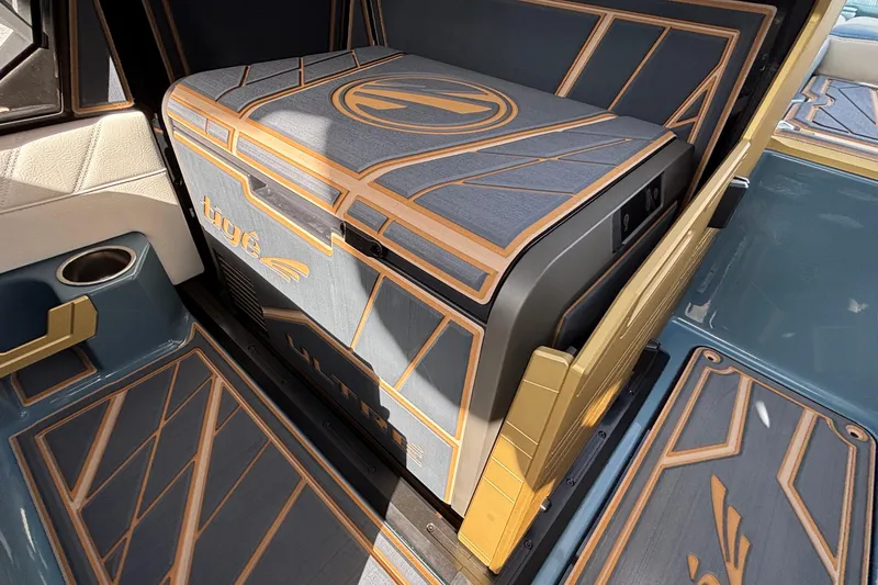 Slide: The Image of 2026 Tigé Ultré 25ZX interior with stylish geometric design and integrated storage. - 42