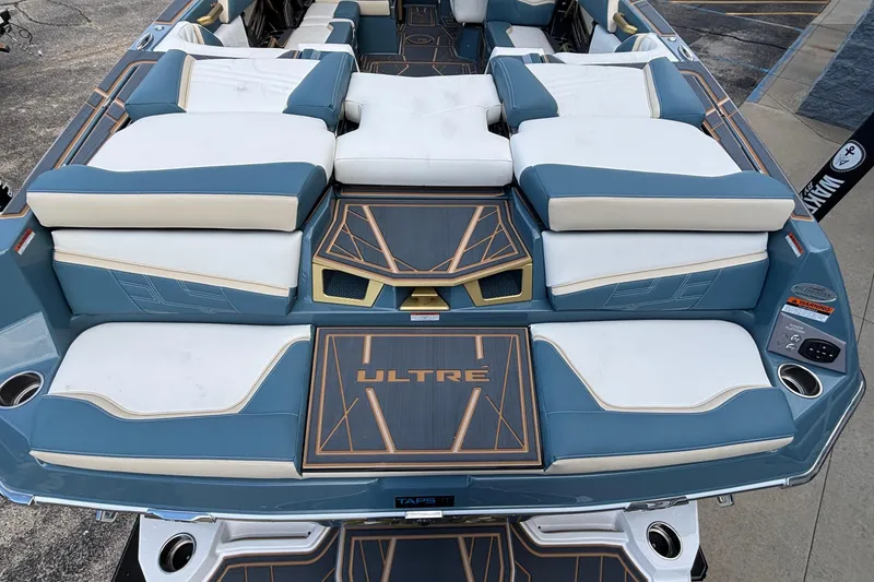 Slide: The Image of 2026 Tigé Ultré 25ZX boat interior with luxurious seating and modern design. - 5