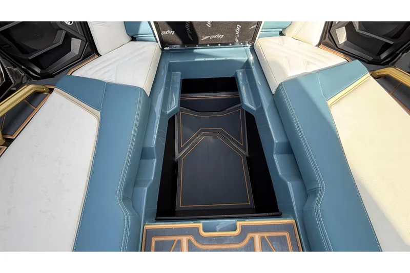 Slide: The Image of 2026 Tigé Ultré 25ZX interior seating with blue and white upholstery, featuring sleek design. - 58
